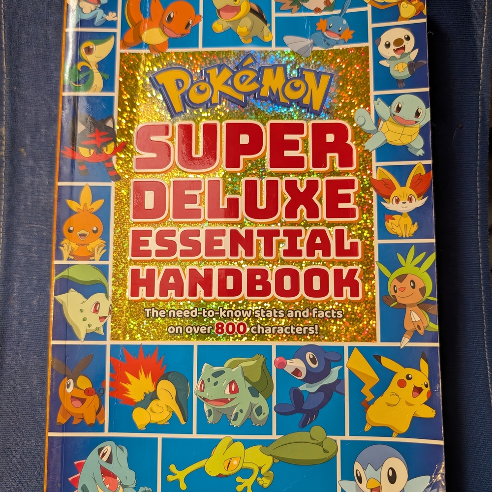Pokemon Super Deluxe Essential Handbook - Blue and Gold